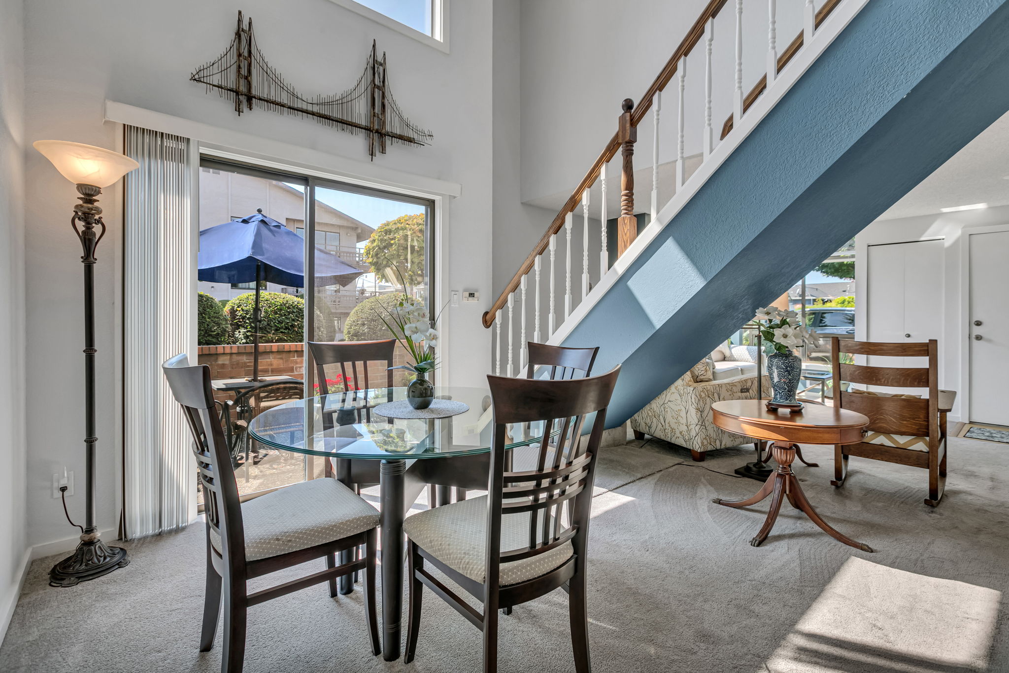 Dining area flows easily between the kitchen, living room, and patio.