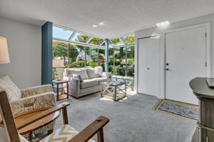Front door opens to the living room with a convenient entry closet.