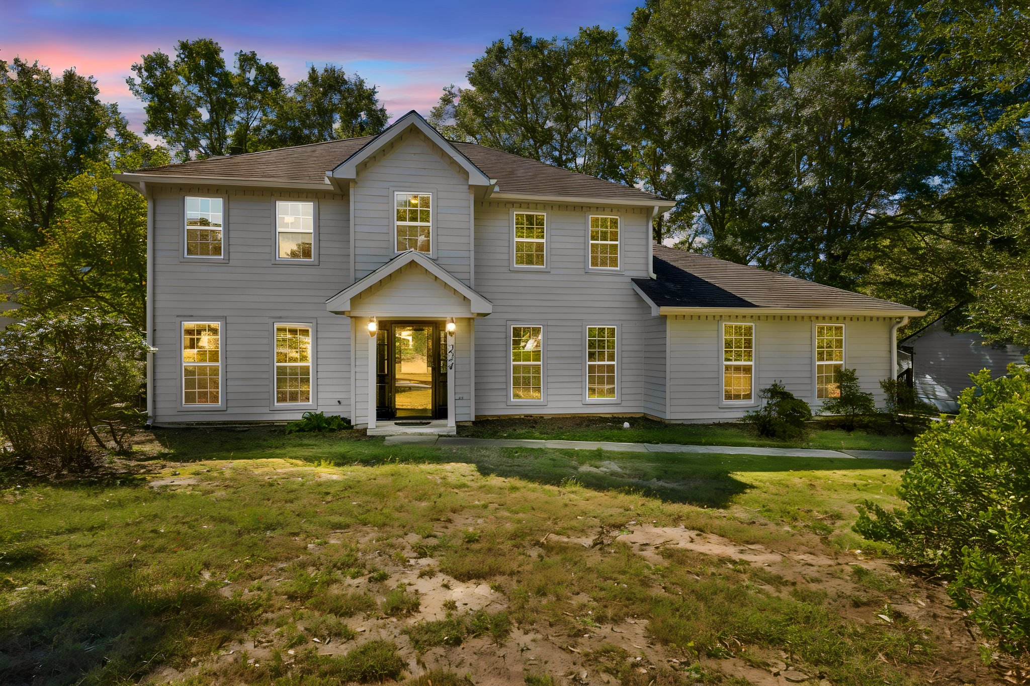 Front of Home day to dusk.jpeg