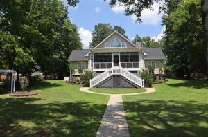 DAPPLED SUNLIGHT, LUSH GREEN LAWN