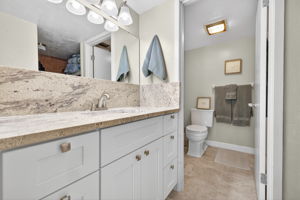 Primary bath is glassed in shower