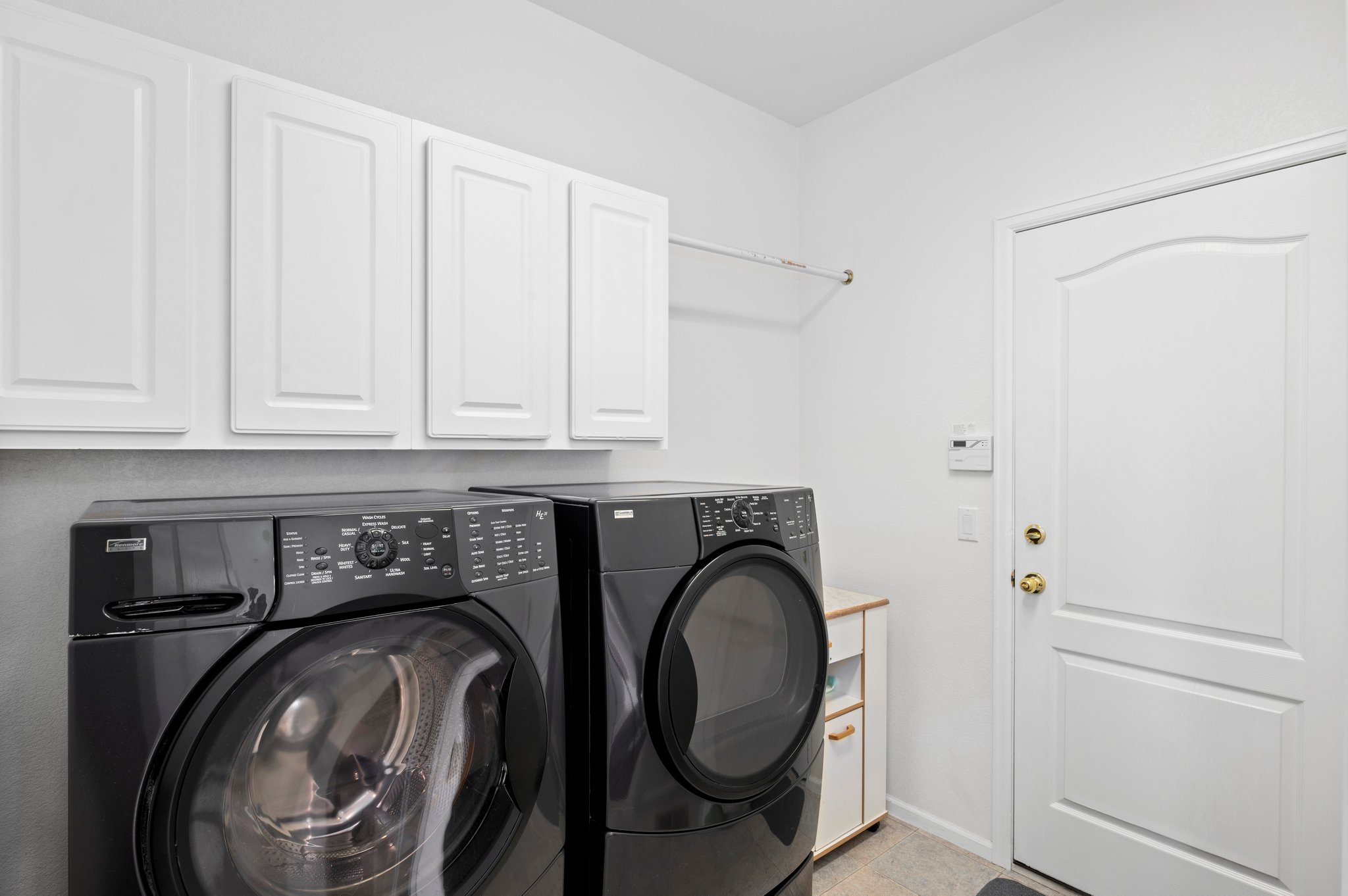 Mainfloor Laundry Room/Mudroom located off Garage~ Washer and Dryer Included