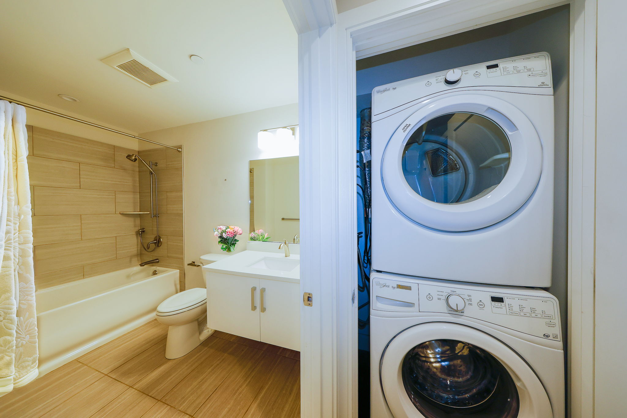 10 - Stacked Washer + Dryer in Closet