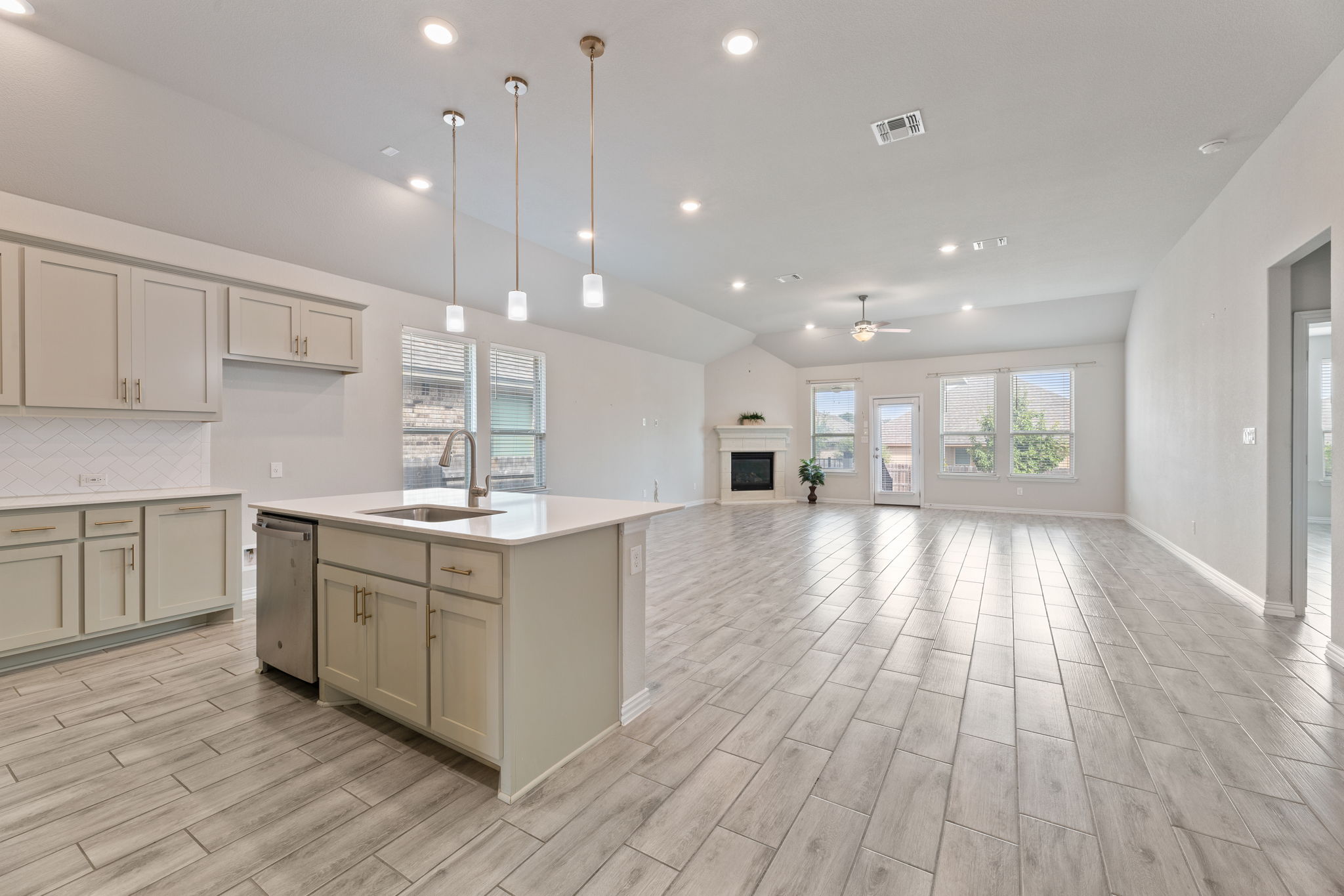 Kitchen area with big living area towards patio