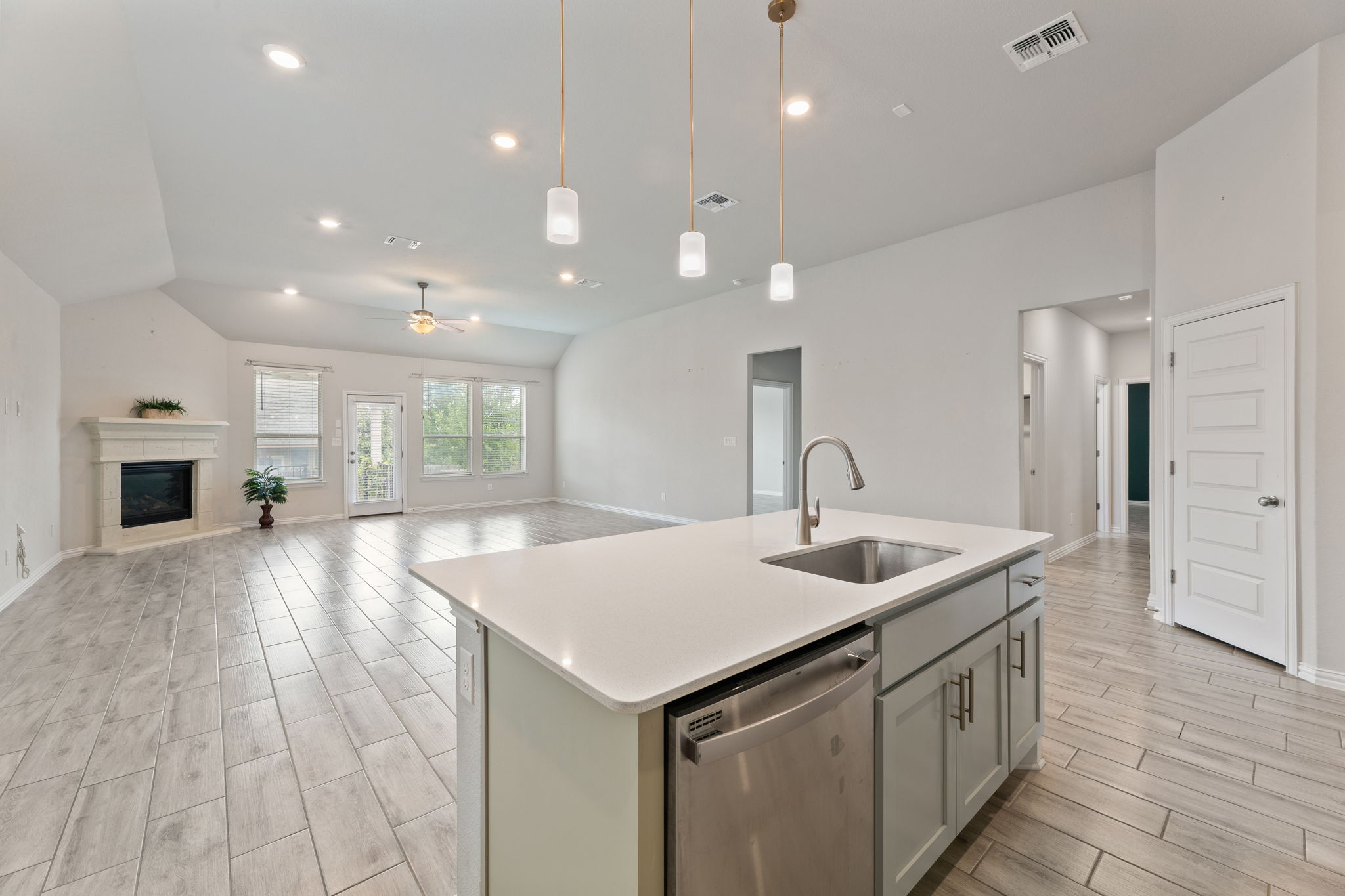 Kitchen view to living  area and fireplace