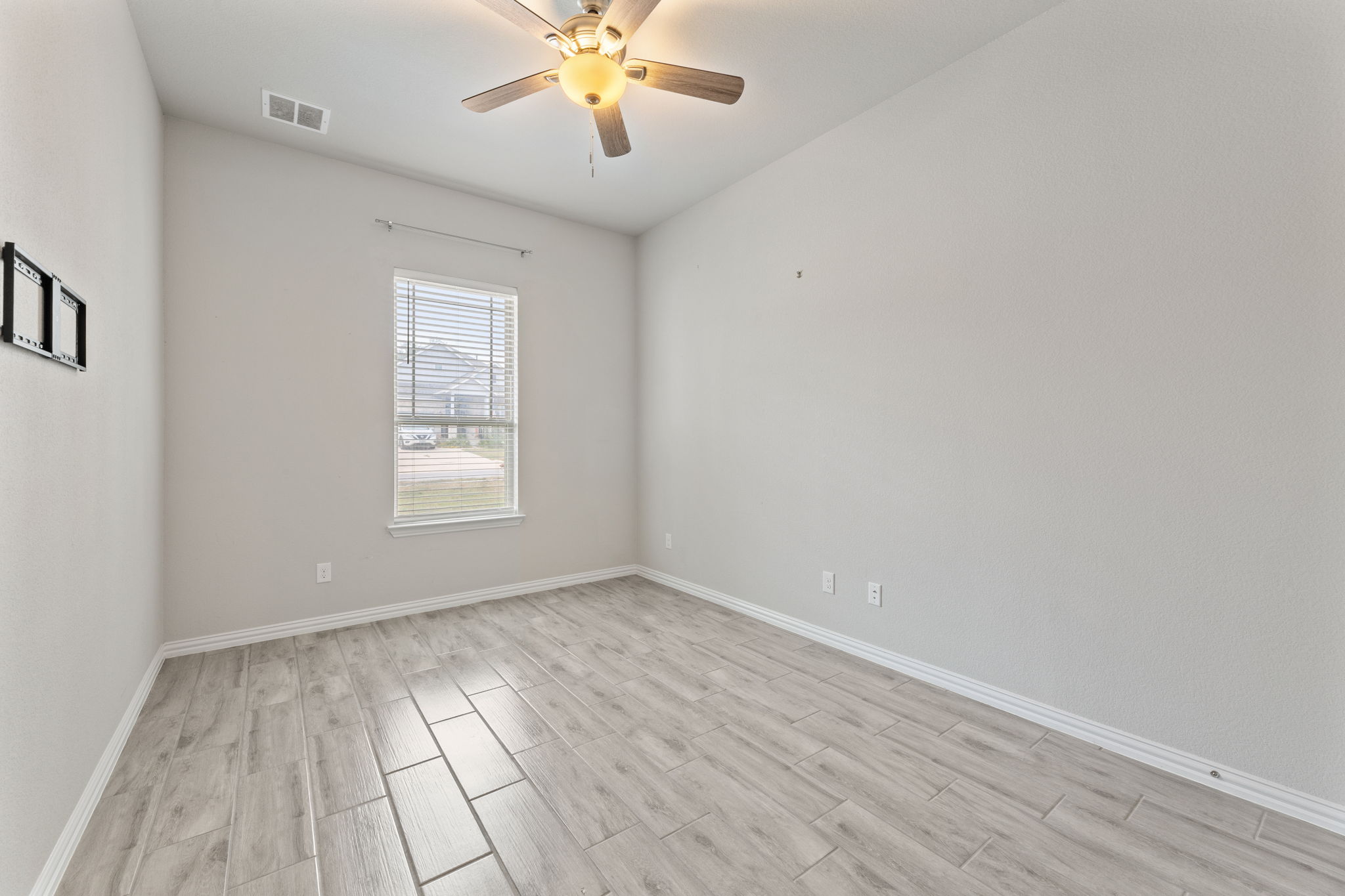 Front Bedroom with View of Front of Home