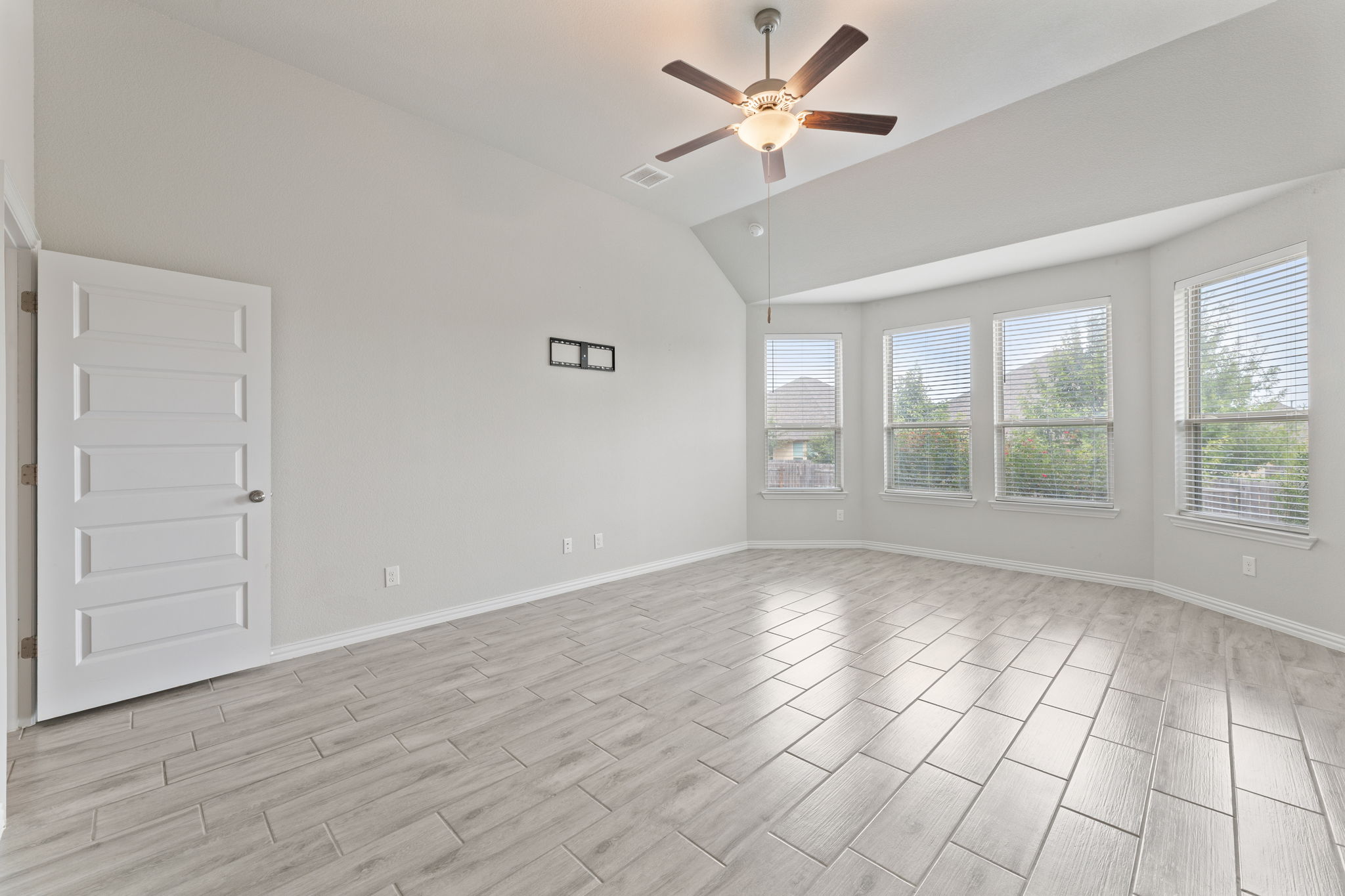 Primary Bedroom with Views to Back Area of Home