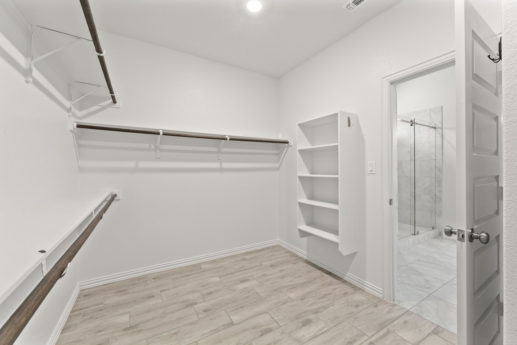 Primary Bedroom Walk in Closet