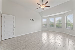 Primary Bedroom with Views to Back Area of Home