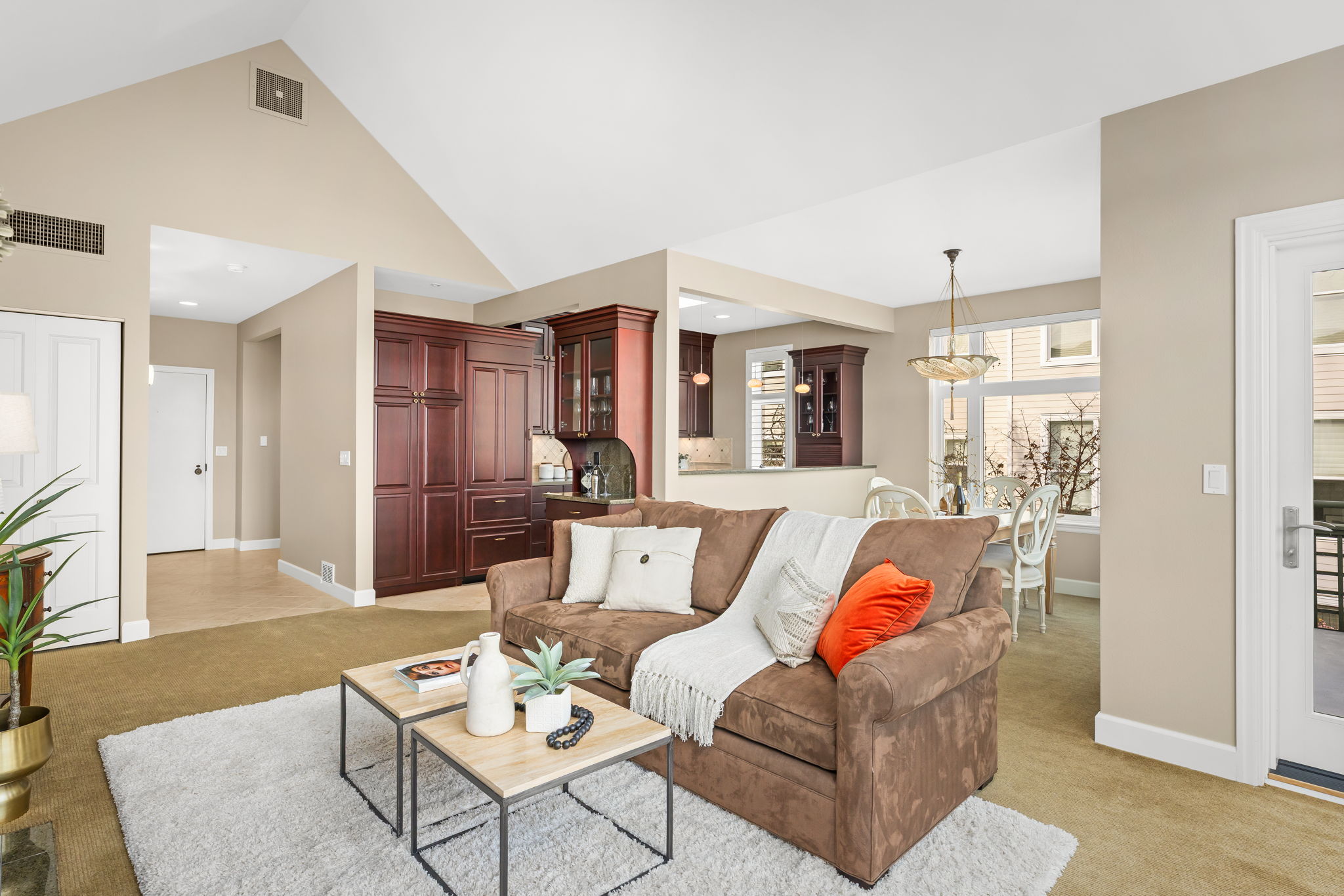 12. Open floor plan to deck, kitchen and dining room