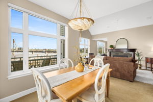 20. Dining room with view to the deck and living room