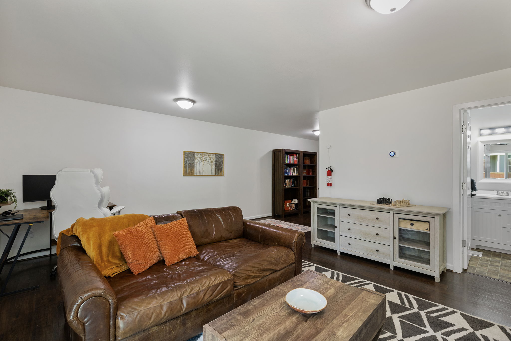 Another shot of lower level family room with 3/4 bath to the right.