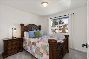 Main level guest bedroom #1. Newer carpets.