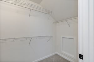 Large walk in closet in primary suite.