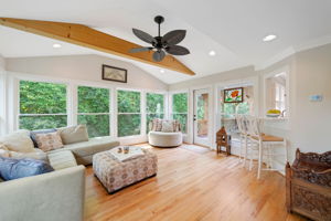 Sunroom has direct access to covered deck