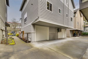 Freshly painted, lovely walkway & driveway to garage