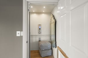 Elevator to main living room and garage