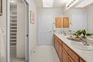 Walk-in closet closes with space-saving pocket doors