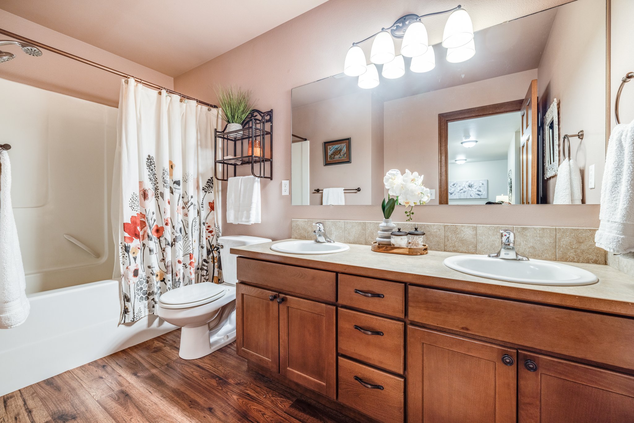 Guest Bath has double sinks, lots of counter & cabinet space