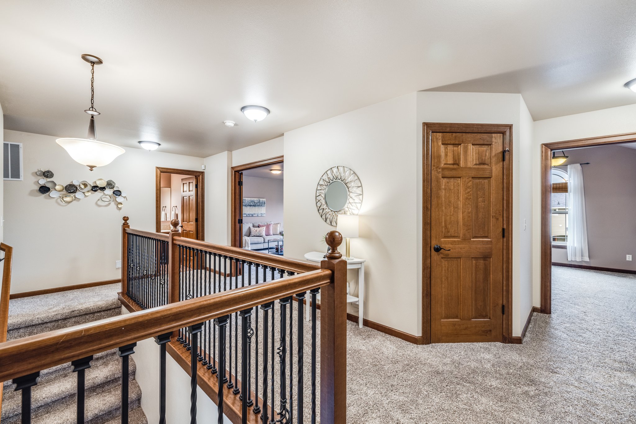 Upstairs landing with walk in linen closet