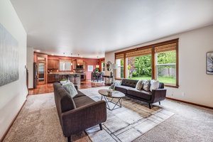 Natural light fills the space, carpet is new