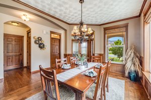 Formal Dining with wood details & lots of natural light.