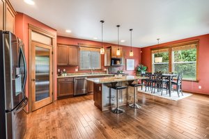 Kitchen/Breakfast Bar has granite countertops