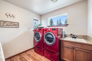 Laundry Room with lots of natural light, sink & storage space (Washer & Dryer Convey