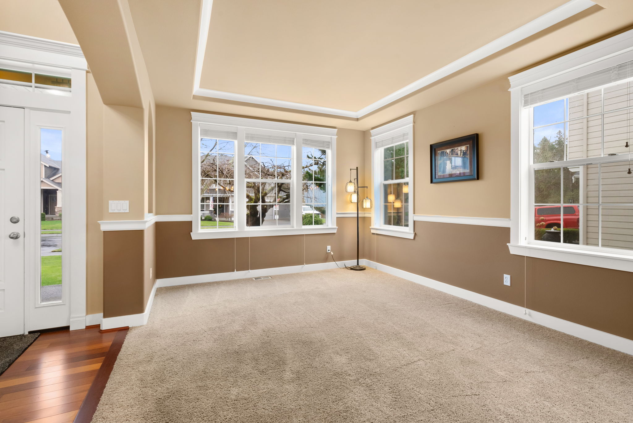 Light-filled formal living room with architectural detail.