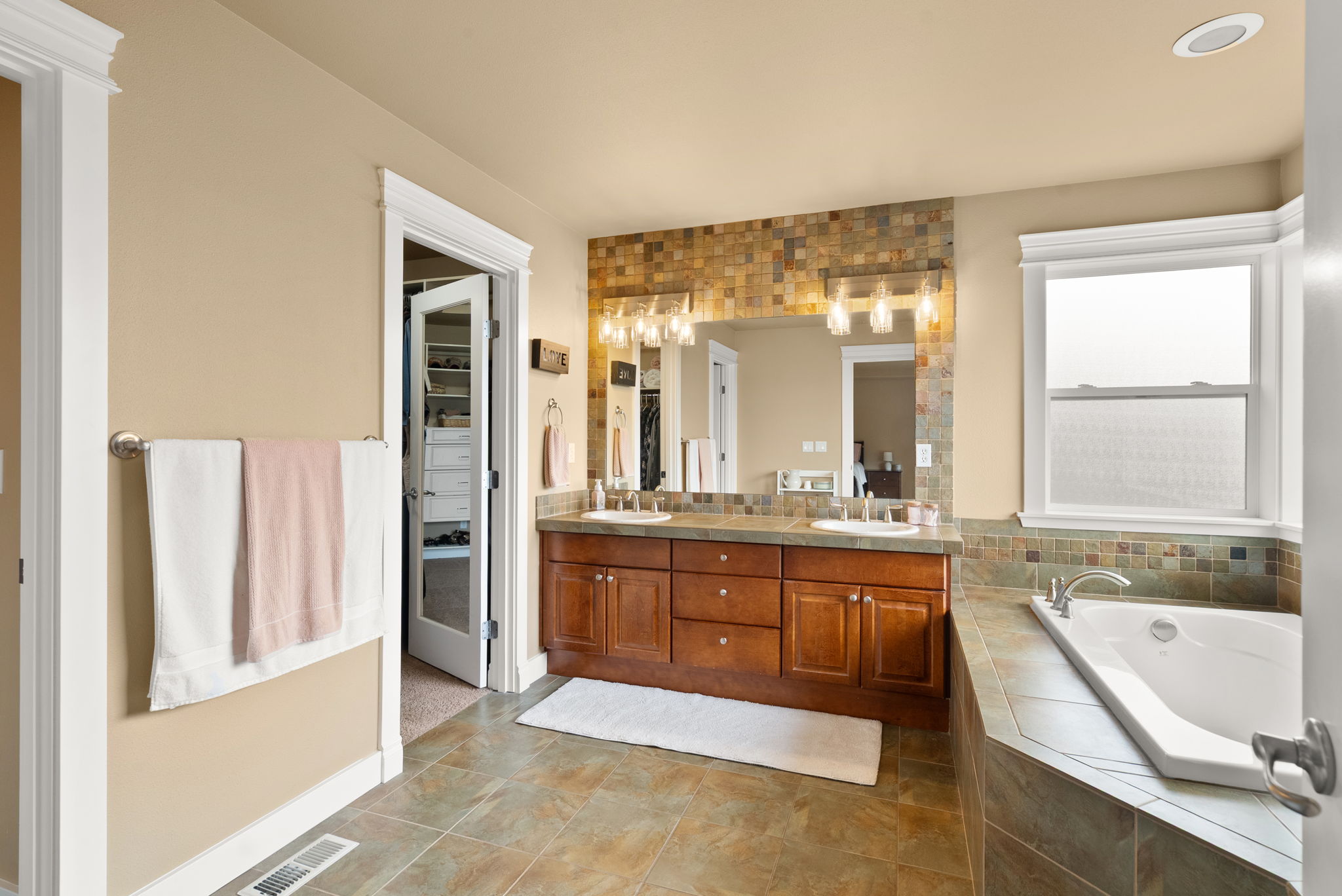 Elegant primary ensuite offering a relaxing retreat.