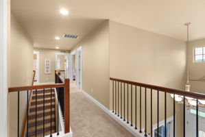 Spacious upstairs landing overlooking the formal entry.
