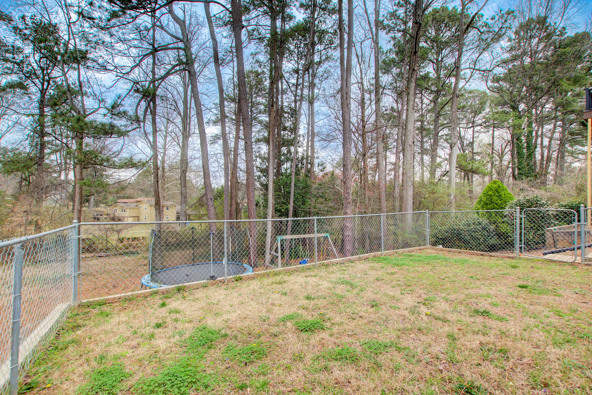 38 Exterior Fenced In Yard w Rear Lot View