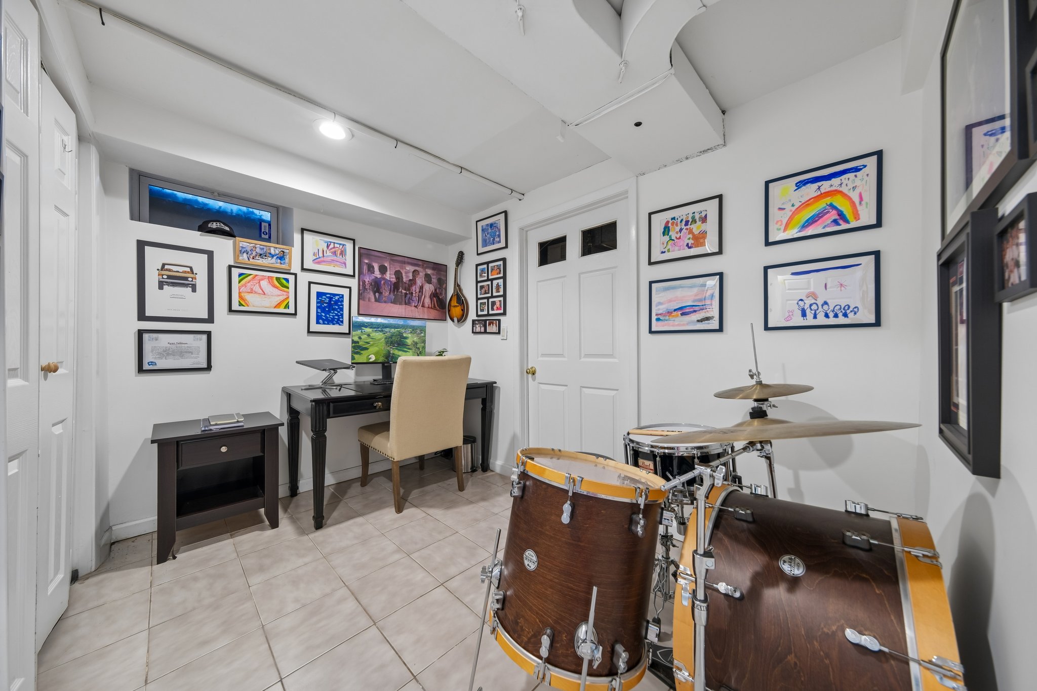 A great, tucked away lower level space to work from home. On the days you need to go to the office? NYC commute convenience wrapped inside a hidden hillside neighborhood.