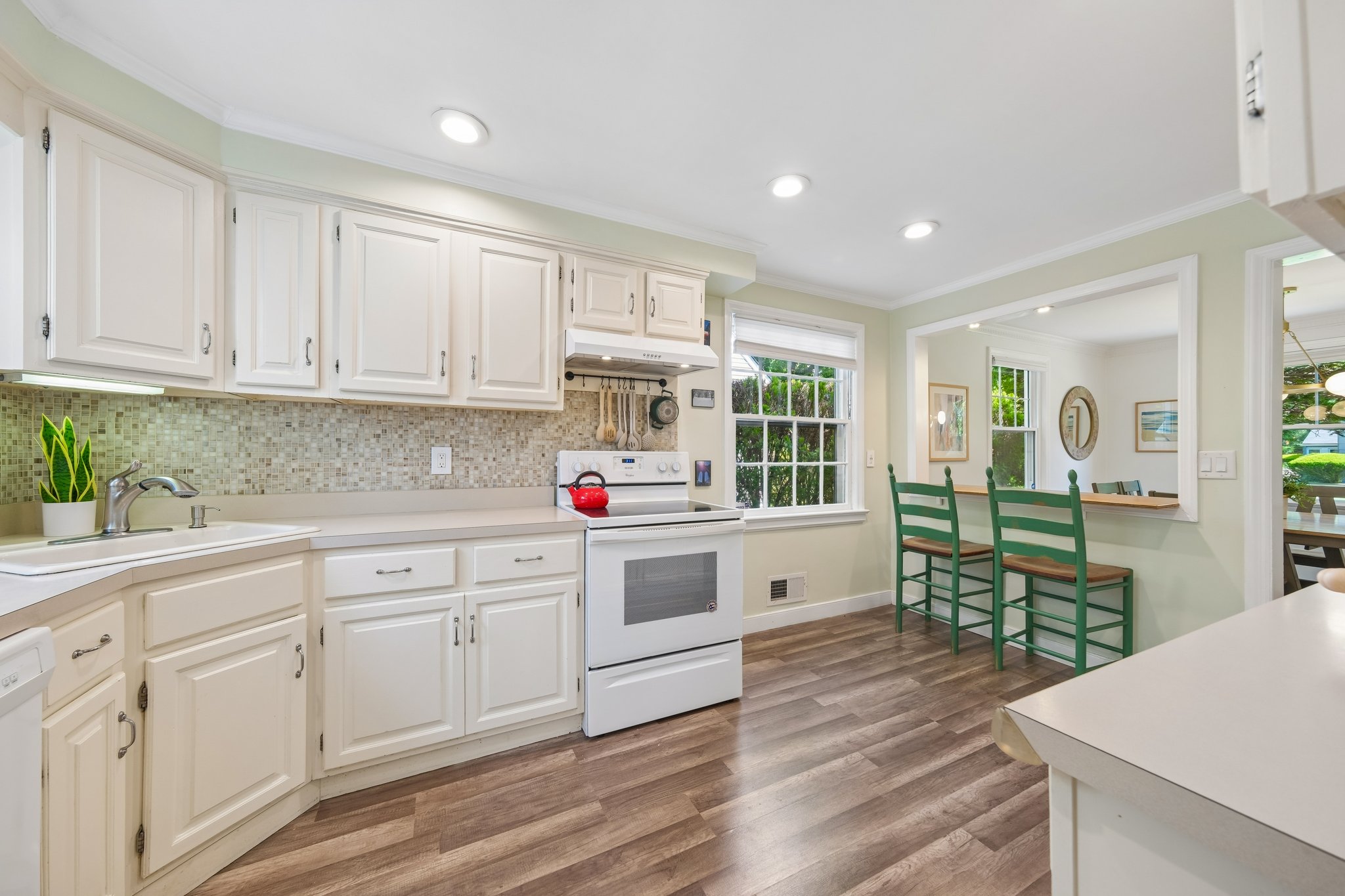 The breakfast bar becomes command central here - morning coffee, homework help, late-night chats, and quick bites before the NYC commute. The kind of kitchen that quietly keeps everyone connected.