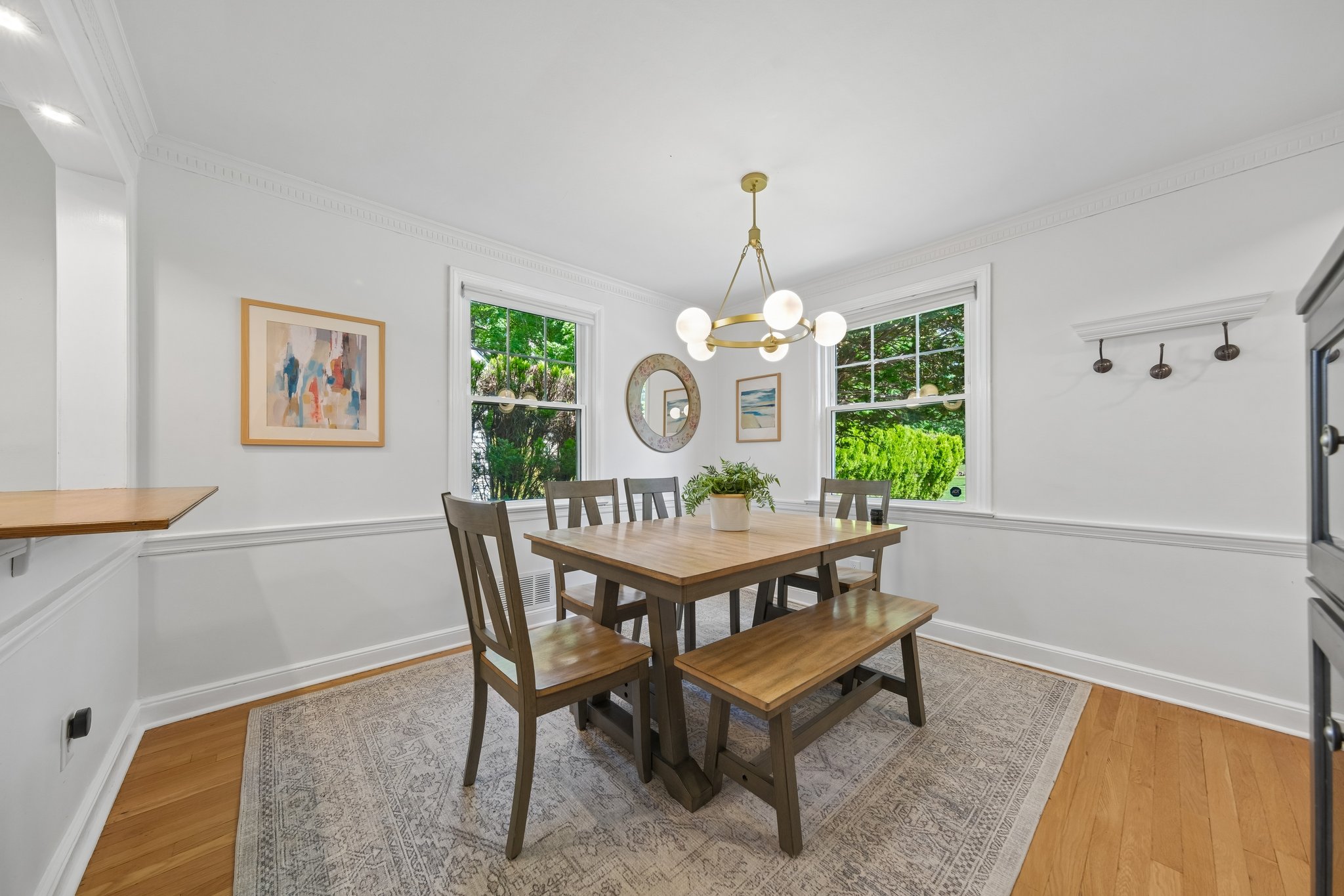 The dining room was made for traditions - candles glowing, music playing, stories getting retold, and plates passed through from the kitchen.