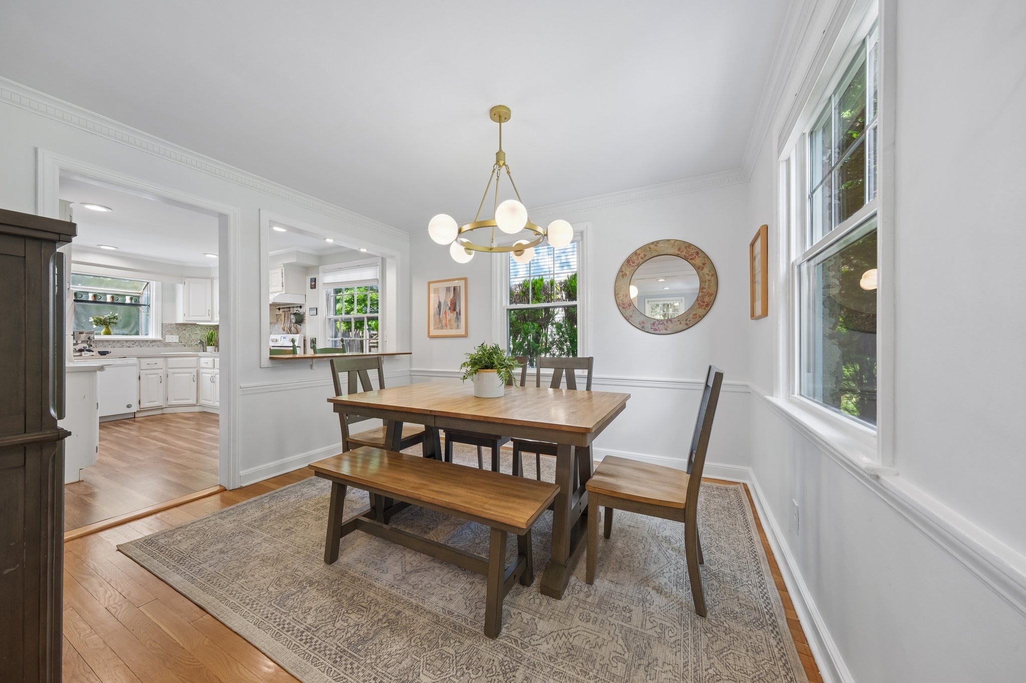 Wonderfully connected to everyday life with a charming pass-through to the kitchen that keeps conversations, homework help, and second helpings all within easy reach.
