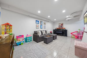 The kind of lower level where music lessons, movie nights, workouts, and creativity all coexist beautifully.