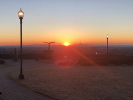 Sunrise behind the NYC skyline from Eagle Rock Reservation which boasts 400 acres of hiking trails.