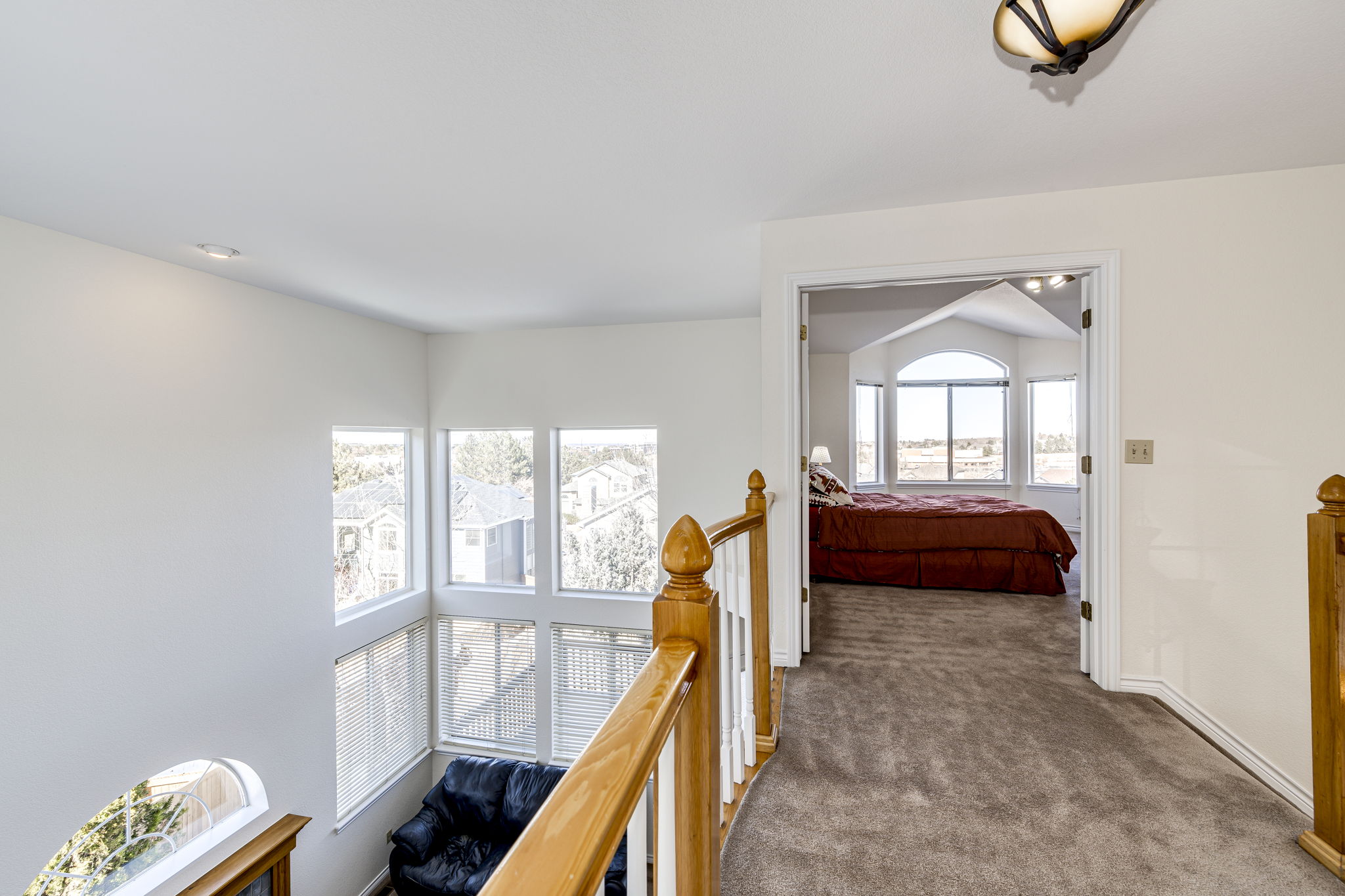 View of the upstairs hallway looking into the Primary bedroom entry