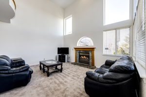 Family room with a cozy fireplace to keep you warm on a chilly Colorado night!