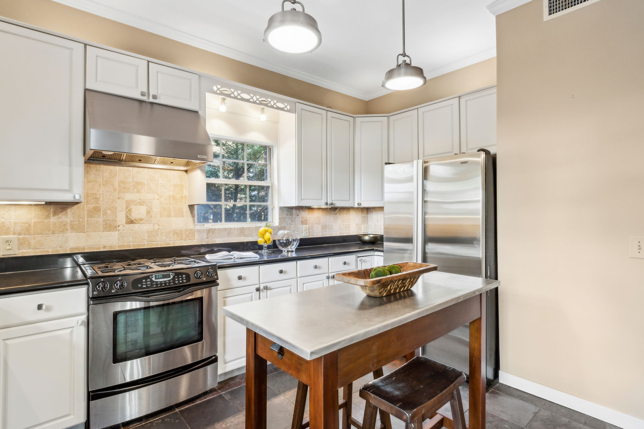 The kitchen blends modern style with contrast...