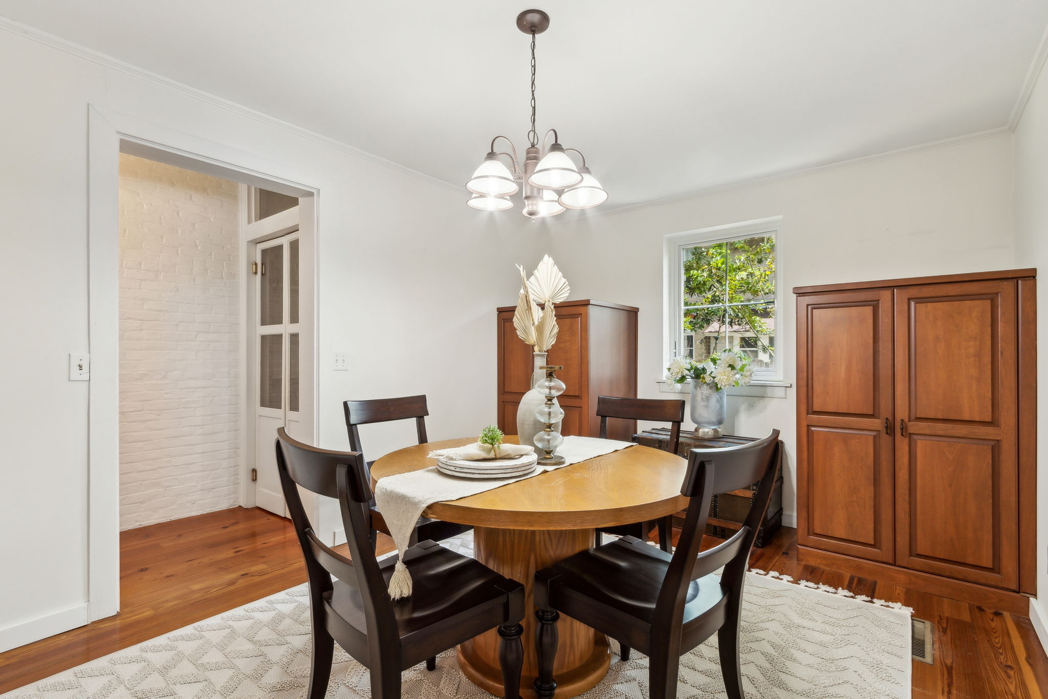 Just off the kitchen is an informal dining area...