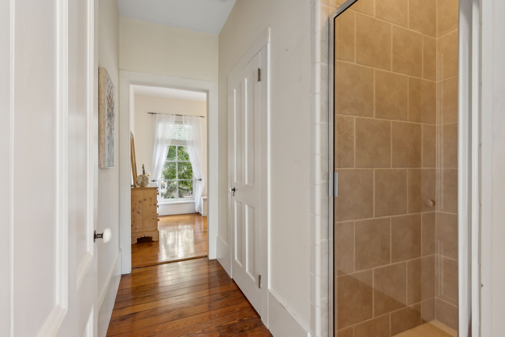 ...and floor-to-ceiling tiled shower.