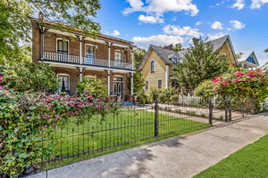 Framed by neighboring homes of equal historic charm,