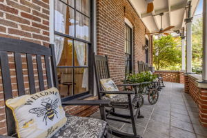... from the welcoming covered porch to the front-facing balcony that adds period charm.