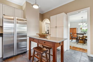 Enjoy the practicality of dual pantries, with storage in both the kitchen and laundry room.