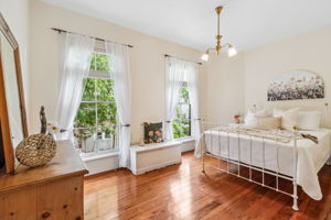 The 3rd ensuite guest bedroom is bright and airy...