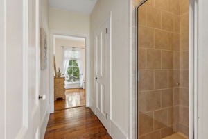 ...and floor-to-ceiling tiled shower.