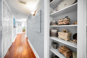 Hallway - Laundry on Left - Guest Bedroom Suites on Right