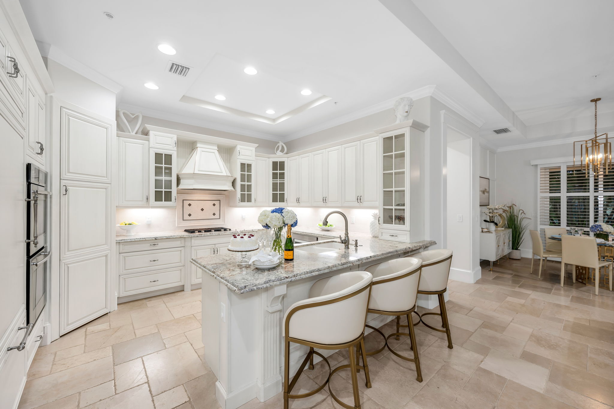 Abundant cabinet storage with breakfast bar and walk-in pantry.